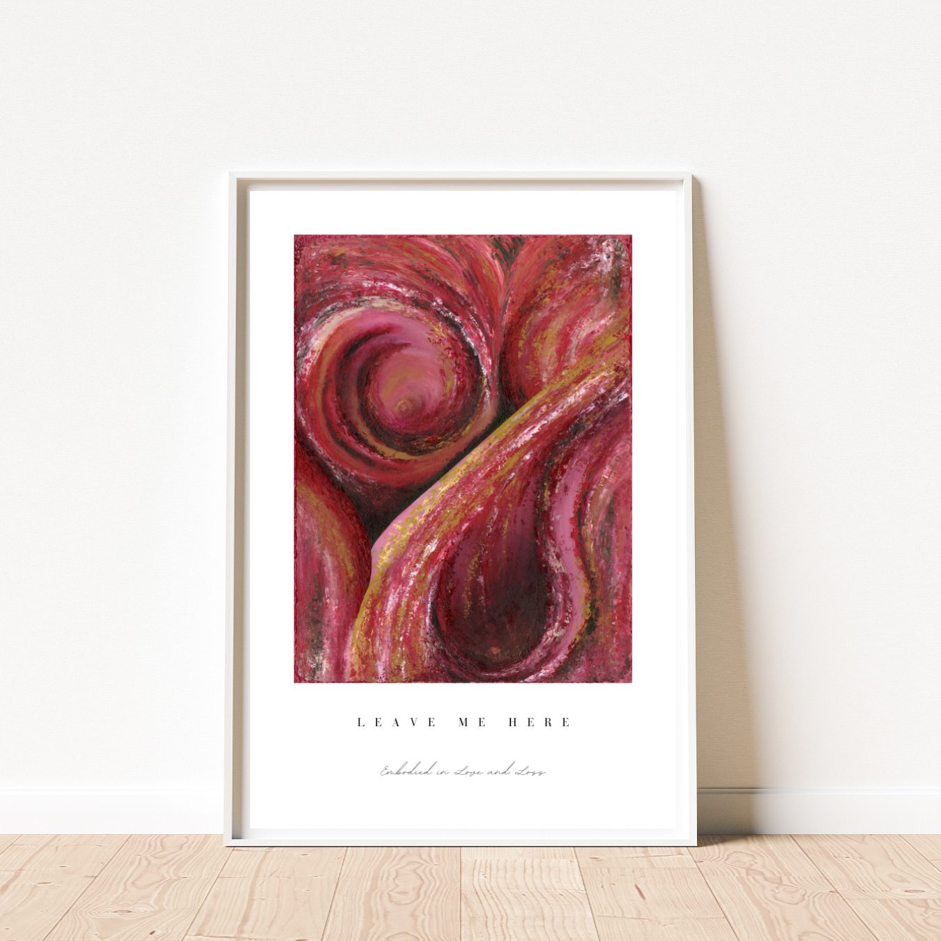 Framed abstract art print with swirling red and pink colors on a white background.