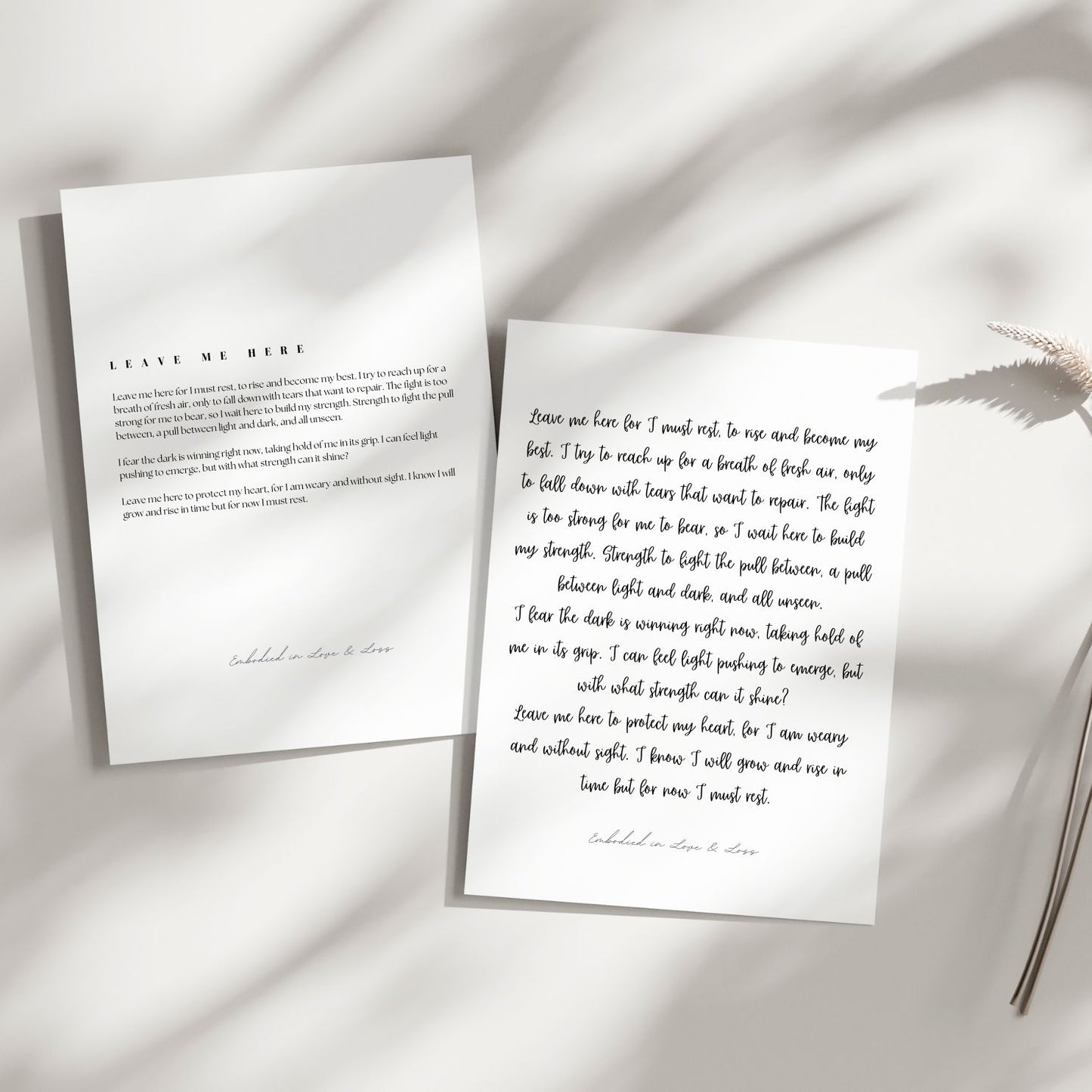 Two sheets of paper with printed text on a light background