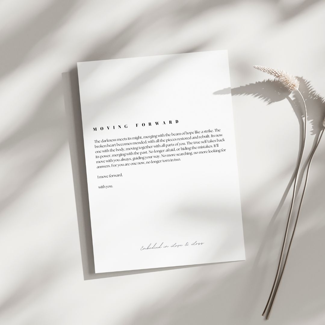 White paper with text on a light background with a dried plant