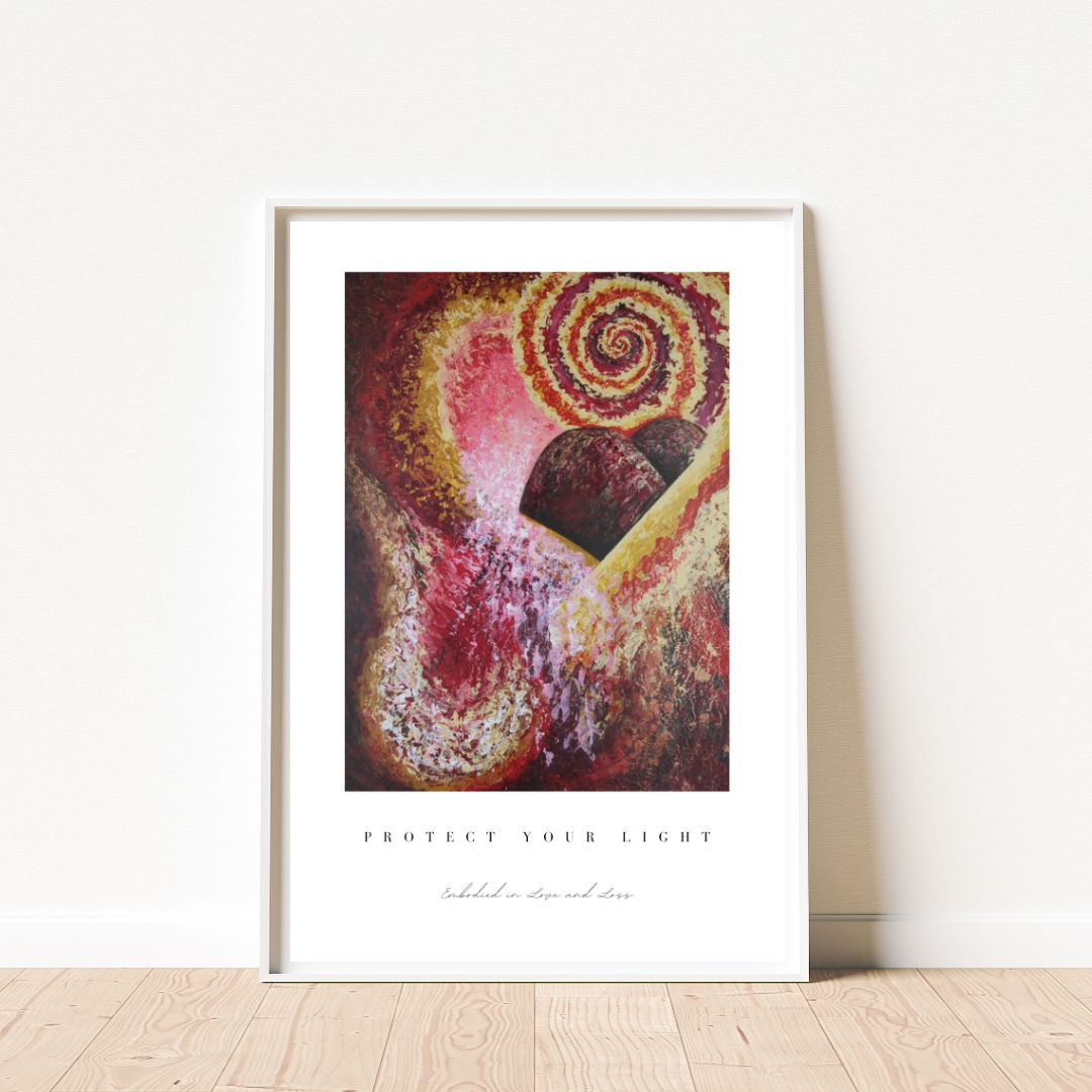 Framed abstract art print with a spiral design on a white wall.