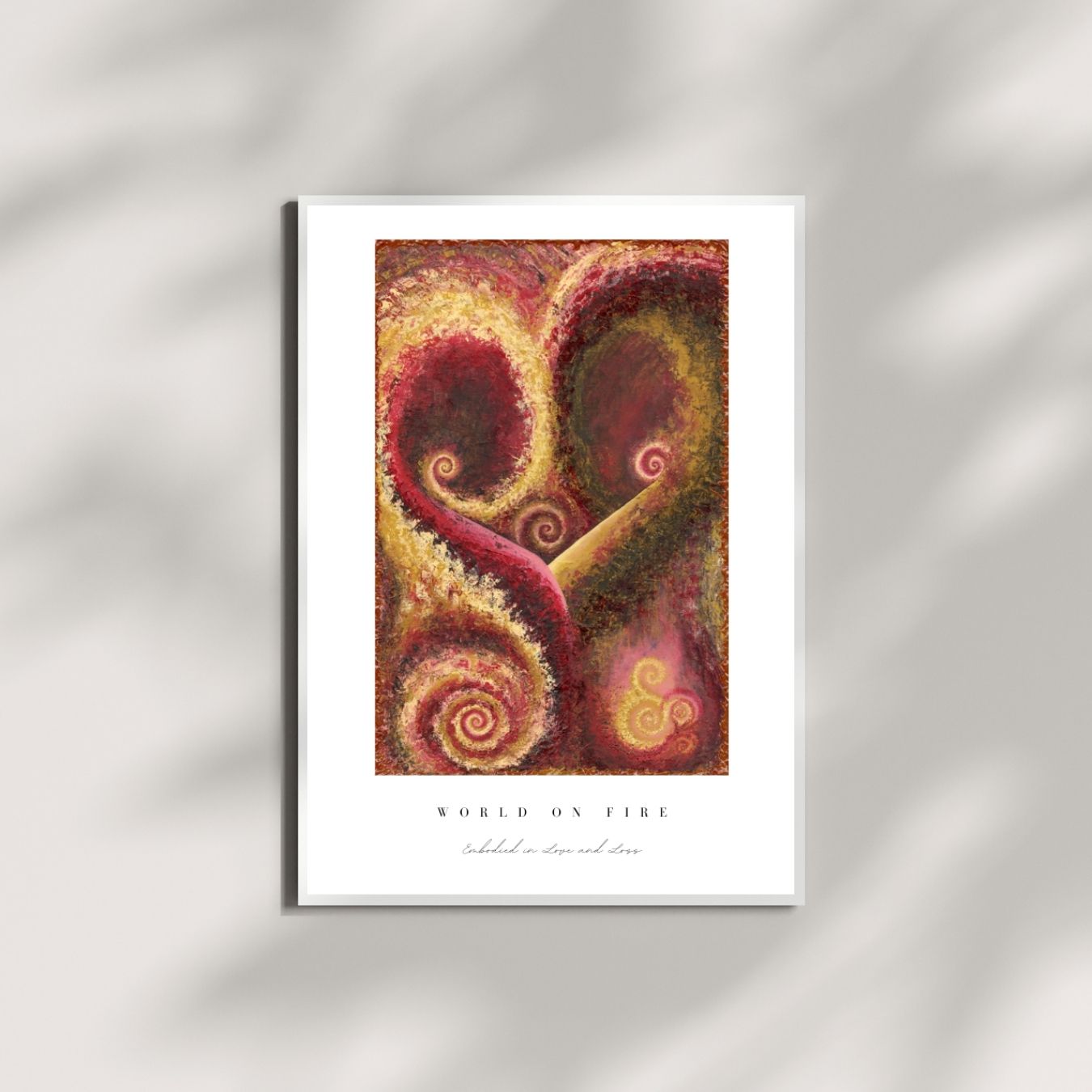 Framed abstract art print with swirling patterns on a white background