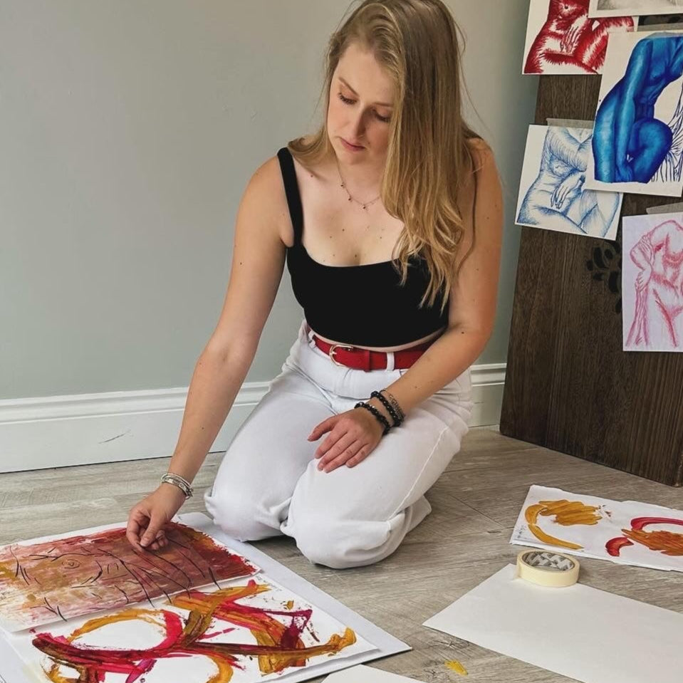 Artist with process drawings