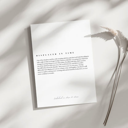 White paper with text on a light background with a plant