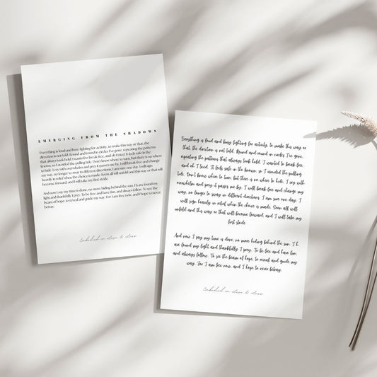 Two sheets of paper with printed text on a light background