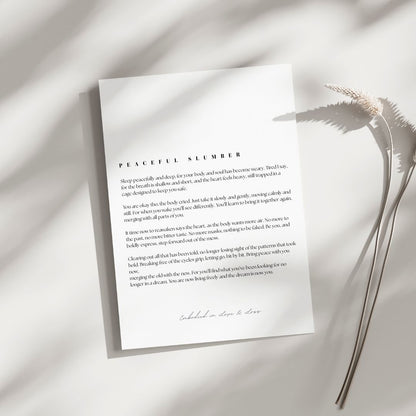 Sheet of paper with text on a light background with dried plants