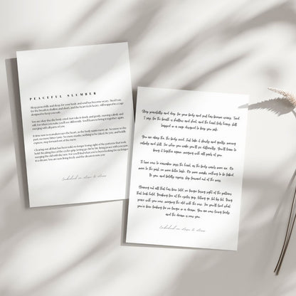 Two sheets of paper with printed text on a light background