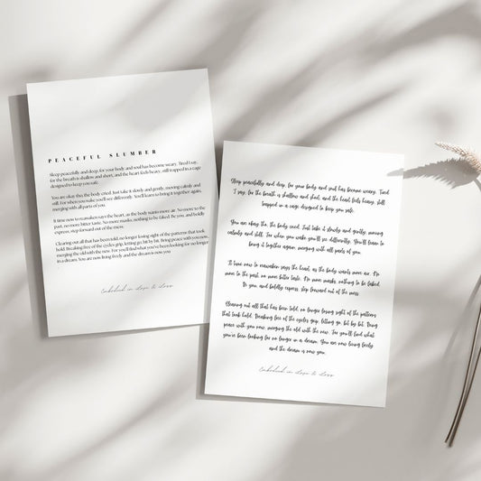 Two sheets of paper with printed text on a light background