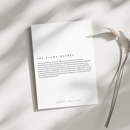 Poem art print on a light background with a plant leaf