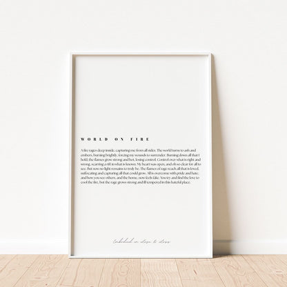Framed poem titled 'World on Fire' on a white wall.